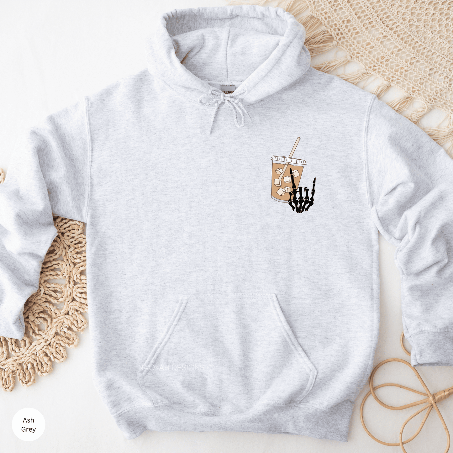 Stay fueled and stylish with our new 'Fueled by Iced Coffee and Anxiety' Sweatshirt. With a skeleton hand and an iced coffee on the front and the phrase 'fueled by iced coffee and anxiety' on the back, you'll never have to worry about running low on fuel or style. Stay energized, cool, and confident in our high-quality sweatshirt!